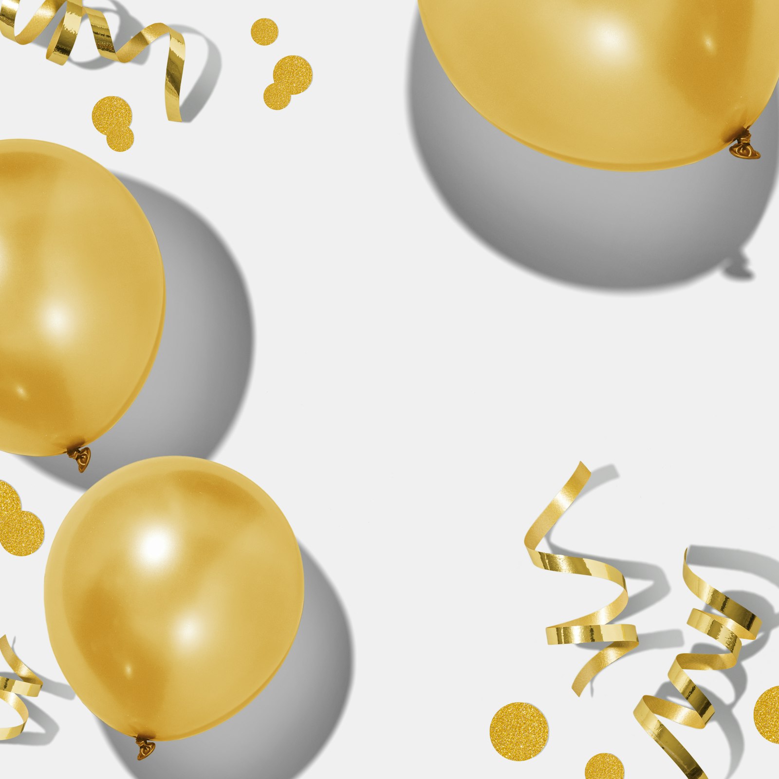 Gold balloons and confetti for celebration decor